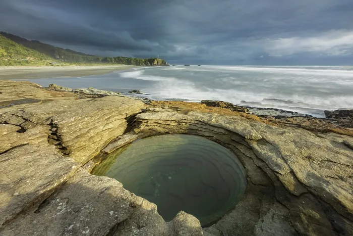 Framed Print : Layered limestone circular rock pool on the coast at Punakaiki in Paparoa National Park, West Coast, South Island, New Zealand. Autumn (May) 2025 Framed Print : Layered limestone circular rock pool on the coast at Punakaiki in Paparoa National Park, West Coast, South Island, New Zealand. Autumn (May) 2025