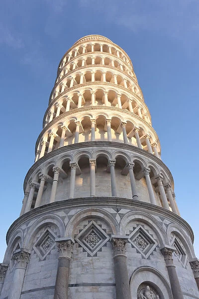 Leaning tower of Piazza dei Miracoli illuminated by a ray of sunshine