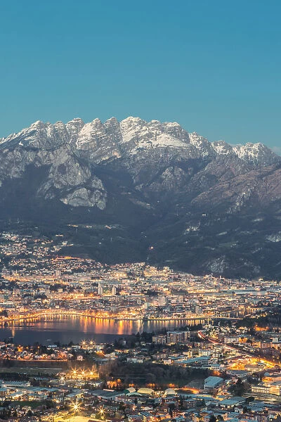 Lecco province at dusk with Resegone mount in the background viewed from San Tomaso
