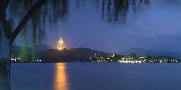 Leifeng Pagoda at dusk, West Lake (UNESCO World Heritage Site), Hangzhou, Zhejiang, China