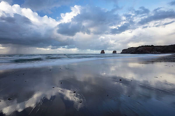 Les deux Jumeaux reflected in the shallow water, , Hendaye beach, Hendaye, Pyrenees-Atlantiques, Nouvelle Aquitaine, France