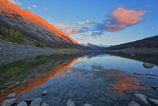 Last light on the Colin Range reflected in Medicine Lake, Jasper National Park, Alberta, Canada