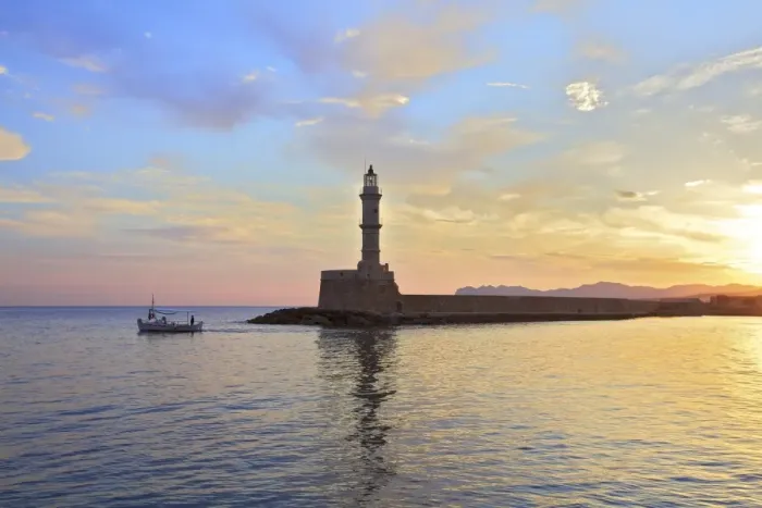 Framed Print : The Light House and Fishing Boat in The Venetian Harbour at Sunrise, Chania, Crete