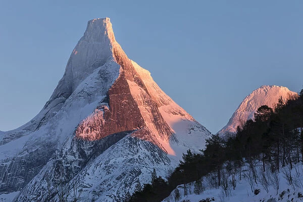 Last light on the Norways national mountains granitic snowy peak called Stetind