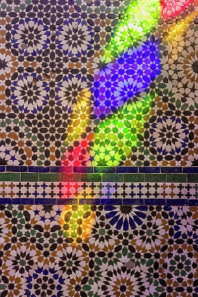 Light from a stained glass window on tiles, Marrakesh, Morocco
