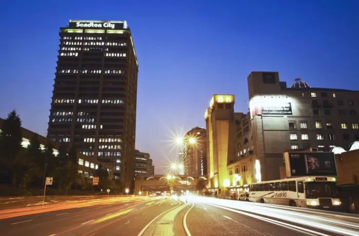 Framed Print : Light trails of traffic passing through downtown Sandton, Johannesburg, Gauteng, South