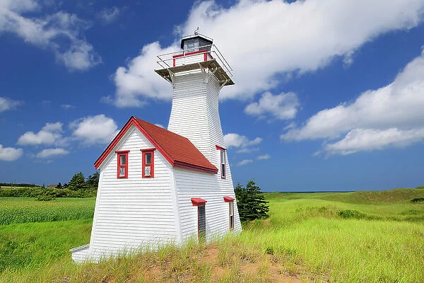 Lighthouse and clouds Prince Edward Island, Canada