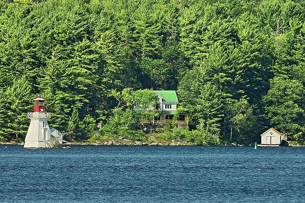 Lighthouse and cottage on Lake Rosseau, Near Rosseau, Ontario, Canada