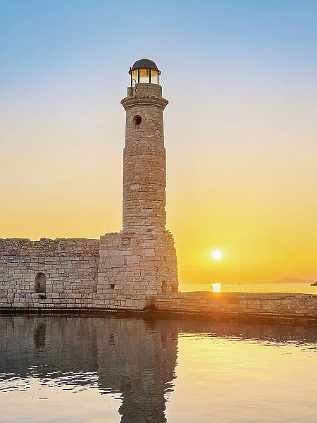 Lighthouse at the Old Venetian Port at sunrise, City of Rethymno, Rethymno Region, Crete, Greece