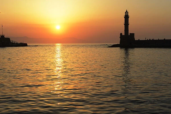 Lighthouse at sunset in Chania, Crete, Greece, Europe