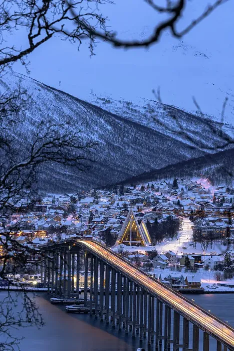 Framed Print : Lights of car trails on Bruvegen Bridge with the snowy Arctic Cathedral on background, Tromso, Norway Framed Print : Lights of car trails on Bruvegen Bridge with the snowy Arctic Cathedral on background, Tromso, Norway