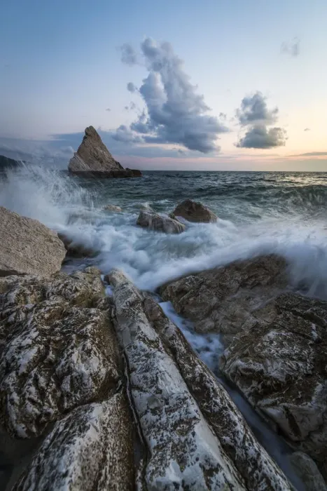 Framed Print : The lights of dusk on the waves crashing on cliffs La Vela Beach Portonovo province Framed Print : The lights of dusk on the waves crashing on cliffs La Vela Beach Portonovo province