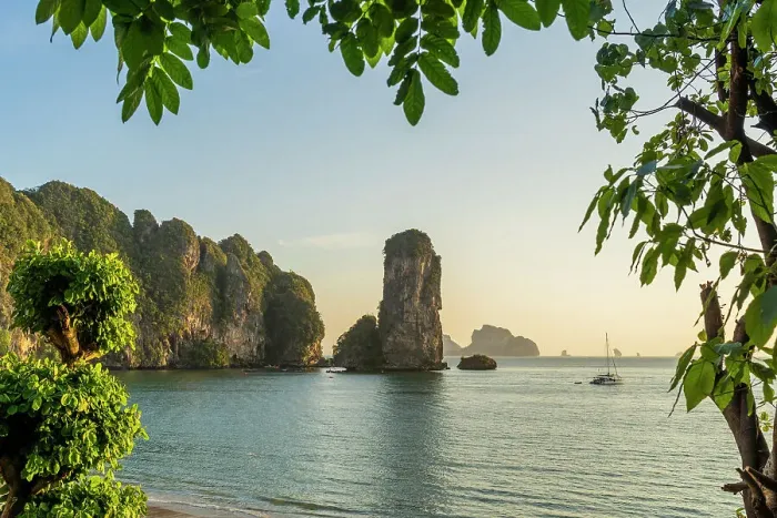 Framed Print : Limestone Karst tower framed by trees on Pai Plong Beach, Ao Nang, Krabi, Thailand Framed Print : Limestone Karst tower framed by trees on Pai Plong Beach, Ao Nang, Krabi, Thailand