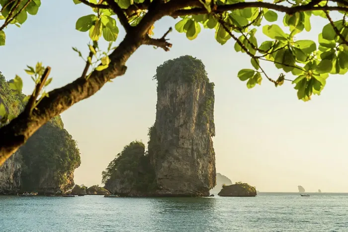 Framed Print : Limestone Karst tower framed by trees on Pai Plong Beach, Ao Nang, Krabi, Thailand Framed Print : Limestone Karst tower framed by trees on Pai Plong Beach, Ao Nang, Krabi, Thailand