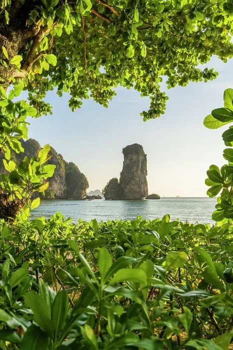 Framed Print : Limestone Karst tower framed by trees on Pai Plong Beach, Ao Nang, Krabi, Thailand Framed Print : Limestone Karst tower framed by trees on Pai Plong Beach, Ao Nang, Krabi, Thailand