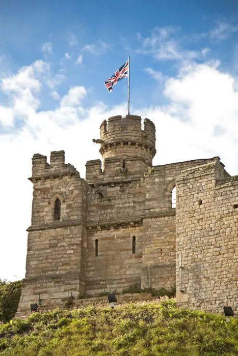 Framed Print : Lincoln, England. The Union Jack flies from the tower of Lincoln castle Framed Print : Lincoln, England. The Union Jack flies from the tower of Lincoln castle