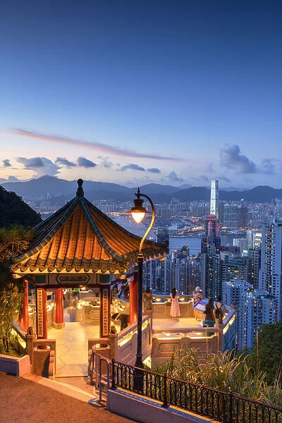 Lion Pavilion on Victoria Peak and skyline at sunset, Hong Kong