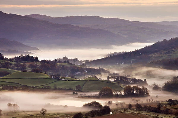 Little Langdale surrounded by mist at dawn, Lake District National Park, Cumbria, England