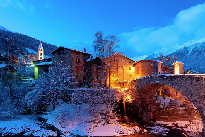 Framed Print : Little village of Bormio after snowfall during dusk, Bormio, Valtellina, Sondrio province, Lombardy, Italy
