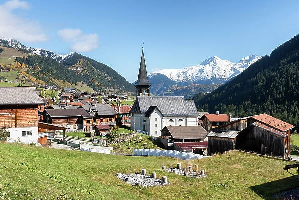 Little village of Tujetsch and in background Piz Muraun, Grisons Canton, Switzerland