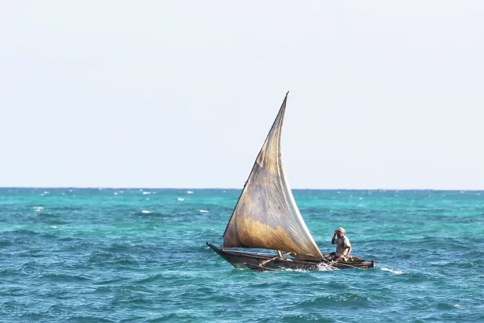 Framed Print : Local fisherman on a small traditional dhow heading out to sea, Nungwi, Zanzibar, Tanzania Framed Print : Local fisherman on a small traditional dhow heading out to sea, Nungwi, Zanzibar, Tanzania