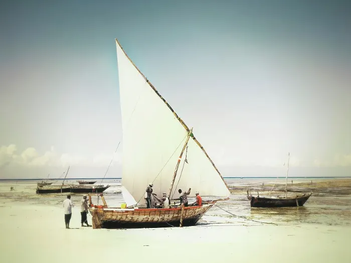Framed Print : Local fishermen preparing their dhow for a fishing trip out at sea, Mkokotini, Zanzibar, Tanzania Framed Print : Local fishermen preparing their dhow for a fishing trip out at sea, Mkokotini, Zanzibar, Tanzania