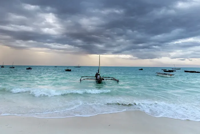 Framed Print : Local fishermen on a traditional dhow, in stormy weather, Nungwi, Zanzibar, Tanzania