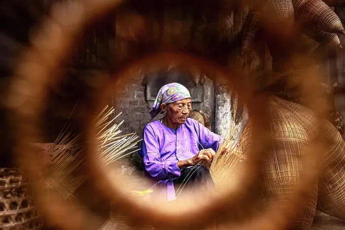 Framed Print : Local woman crafting bamboo fish traps, Hanoi, Vietnam. (MR)