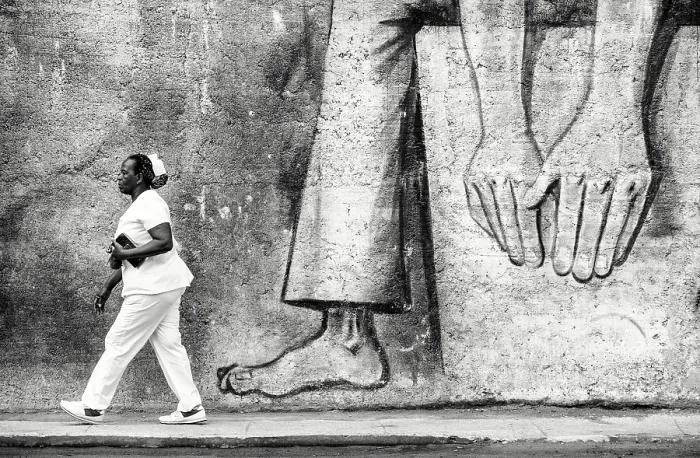 Framed Print : Local woman walking past street art on a wall in Havana Centro, Havana, Cuba, Caribbean Framed Print : Local woman walking past street art on a wall in Havana Centro, Havana, Cuba, Caribbean