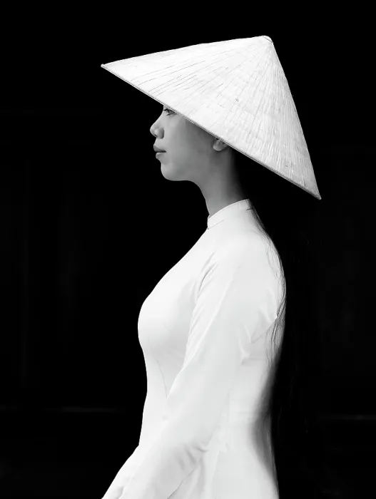 Framed Print : Local woman wearing tradtional Ao Dai dress and conical hat at Minh Mang King Tomb, Hue, Vietnam Framed Print : Local woman wearing tradtional Ao Dai dress and conical hat at Minh Mang King Tomb, Hue, Vietnam