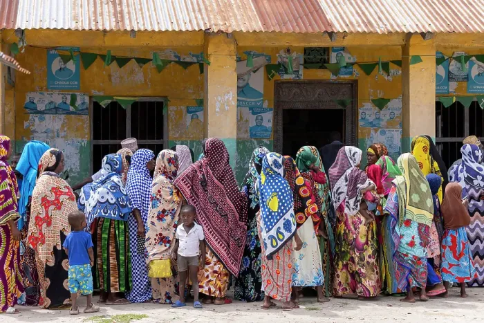 Framed Print : Local women wearing colourful kangas at a village wedding, Bweju, Zanzibar, Tanzania Framed Print : Local women wearing colourful kangas at a village wedding, Bweju, Zanzibar, Tanzania