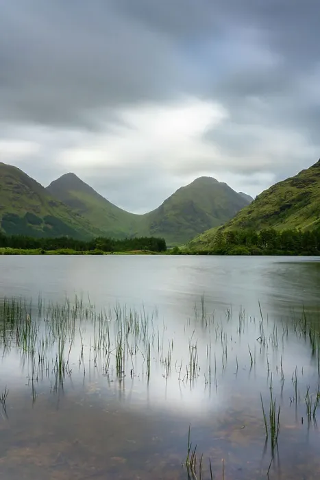 Framed Print : Lochan Urr against mountains, Glencoe, Scottish Highlands, Scotland, UK