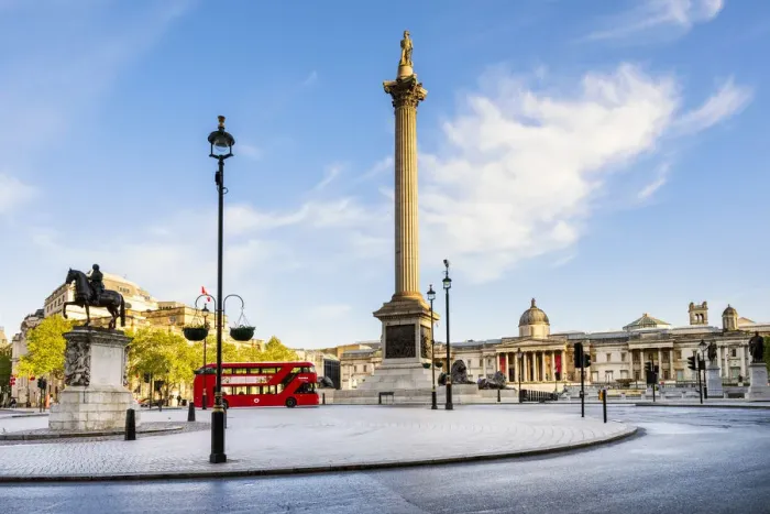 Framed Print : London bus passing the National Gallery and St Martin in the Fields church in Trafalgar Framed Print : London bus passing the National Gallery and St Martin in the Fields church in Trafalgar
