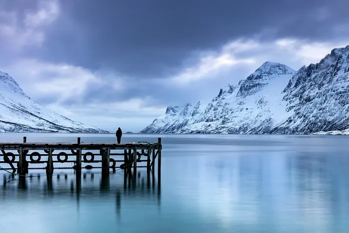Framed Print : Lone figure standing on a jetty at dusk, Ersfjorden, Ersfjordbotn, island of Kvaloya, near Tromos, Norway Framed Print : Lone figure standing on a jetty at dusk, Ersfjorden, Ersfjordbotn, island of Kvaloya, near Tromos, Norway