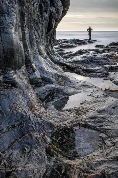 Framed Print : Lone figure standing on shoreline at Porth Ledden, Cape Cornwall, Cornwall, England, UK Framed Print : Lone figure standing on shoreline at Porth Ledden, Cape Cornwall, Cornwall, England, UK