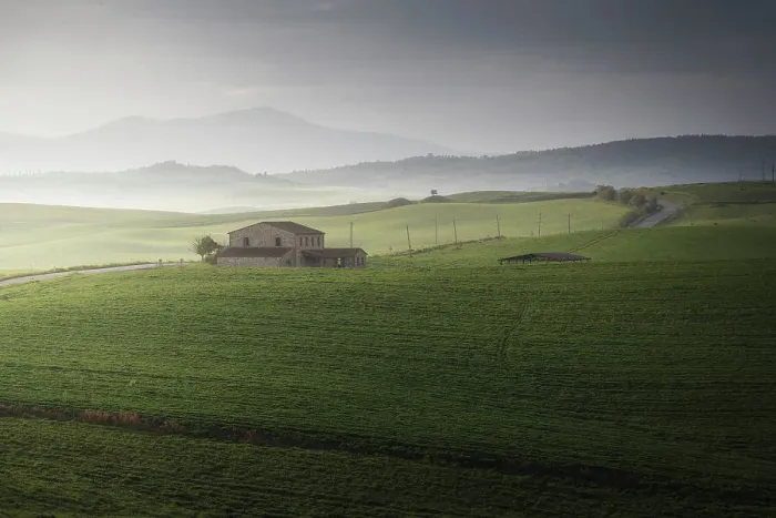 Framed Print : A lonely countryhouse gets the first light of the day as the storm was fading in Val d'Orcia, Tuscany, Italy Framed Print : A lonely countryhouse gets the first light of the day as the storm was fading in Val d'Orcia, Tuscany, Italy