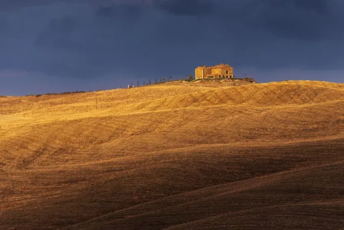 Framed Print : A lonely countryhouse and some rolling hills illuminated by the warm sunset light in autumn, right before a storm rolled in, not far from Montalcino, Val d Orcia, Tuscany, Italy Framed Print : A lonely countryhouse and some rolling hills illuminated by the warm sunset light in autumn, right before a storm rolled in, not far from Montalcino, Val d Orcia, Tuscany, Italy