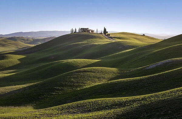 Lonely house into the hills in Asciano outskirt, Siena Province, Tuscany, Italy