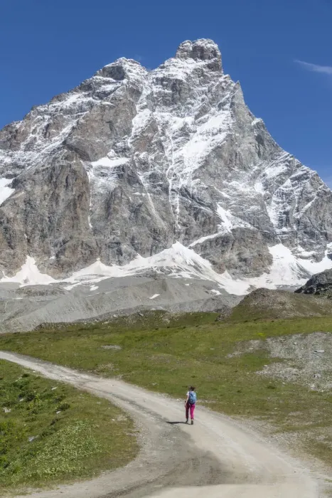 Framed Print : A lonely person hiking under the Matterhorn (Cervino) during a sunny summer day in the Italian Alps Framed Print : A lonely person hiking under the Matterhorn (Cervino) during a sunny summer day in the Italian Alps