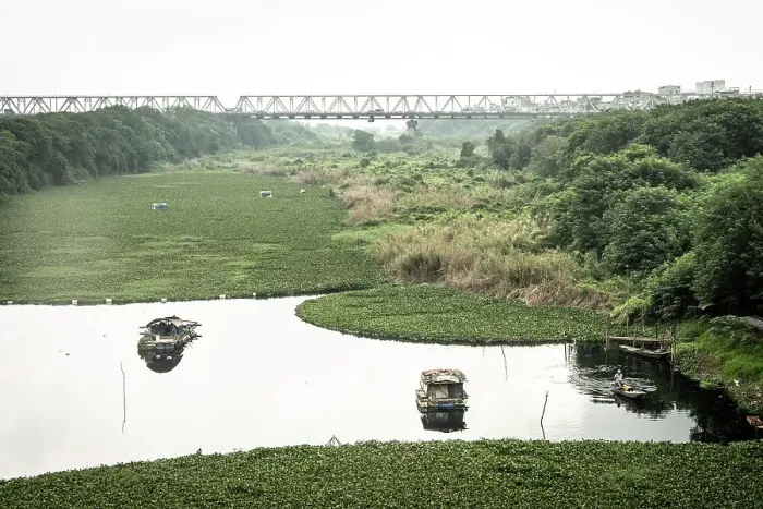 Framed Print : Long Bien Bridge and marshes by the Red River, Hanoi, Vietnam