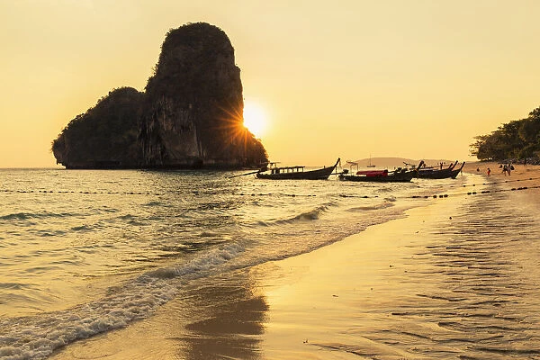 Longtail boats on Phra Nang Beach at sunset, Railay Peninsula, Krabi Provonce, Thailand