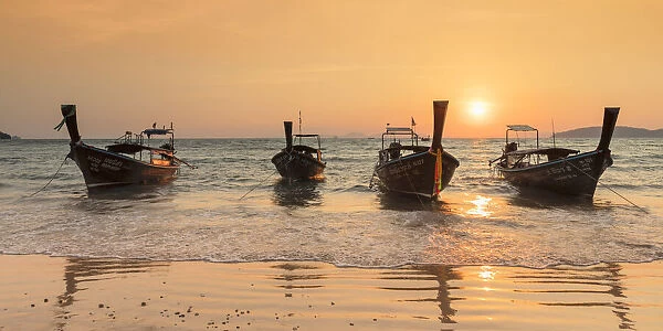 Longtail boats on West Rai Leh Beach at sunset, Railay Peninsula, Krabi Provonce