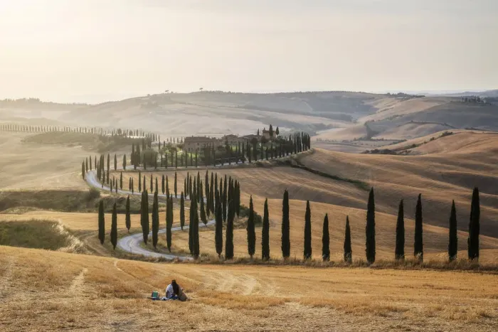 Framed Print : A loving couple found the perfect pic-nic spot: the fields in front of the Agriturismo Baccoleno, in the heart of the Crete Senesi, with all the rolling hills around. Tuscany, Italy Framed Print : A loving couple found the perfect pic-nic spot: the fields in front of the Agriturismo Baccoleno, in the heart of the Crete Senesi, with all the rolling hills around. Tuscany, Italy