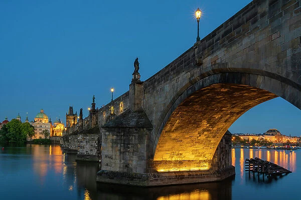 Low angle view of Charles Bridge at twilight, Prague, Bohemia, Czech Republic