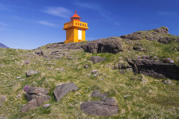 Low angle view of lighthouse on cliff at Djupivogur, East Iceland, Iceland