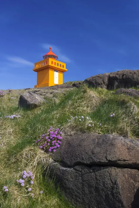 Framed Print : Low angle view of lighthouse on cliff at Djupivogur, East Iceland, Iceland Framed Print : Low angle view of lighthouse on cliff at Djupivogur, East Iceland, Iceland