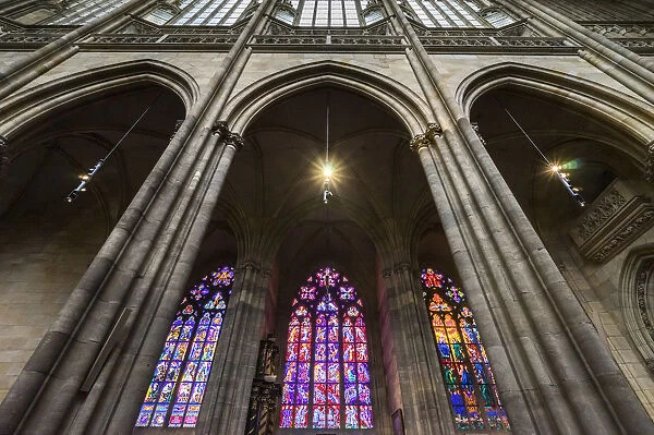 Low angle view of stained glass windows at St. Vitus Cathedral, Prague, Bohemia