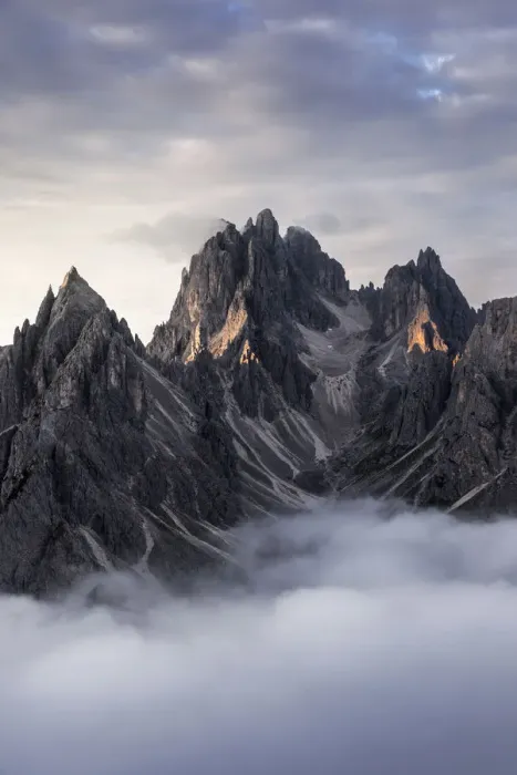 Framed Print : Low fog partially covering the Cadini di Misurina at sunrise in the Dolomites, Italy Framed Print : Low fog partially covering the Cadini di Misurina at sunrise in the Dolomites, Italy