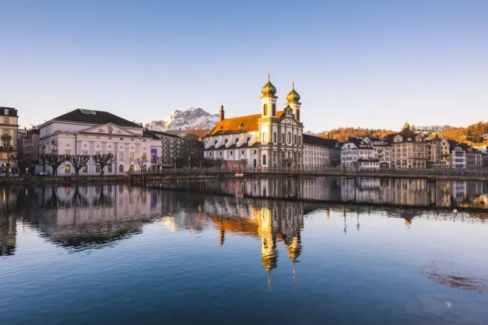 Framed Print : Lucerne, Switzerland. Jesuit church and Reuss rivers waterfront at sunrise Framed Print : Lucerne, Switzerland. Jesuit church and Reuss rivers waterfront at sunrise
