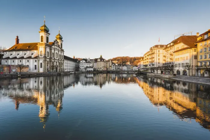 Framed Print : Lucerne, Switzerland. Jesuit church and Reuss rivers waterfront at sunrise Framed Print : Lucerne, Switzerland. Jesuit church and Reuss rivers waterfront at sunrise